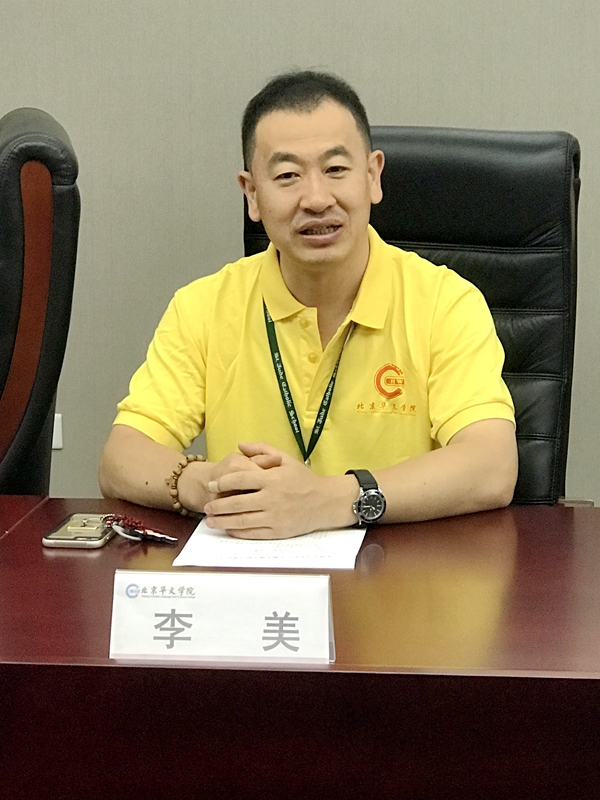 2.李美副校长讲话.jpg